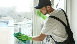 Young male window cleaner