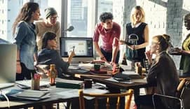 Group of people brainstorming in office