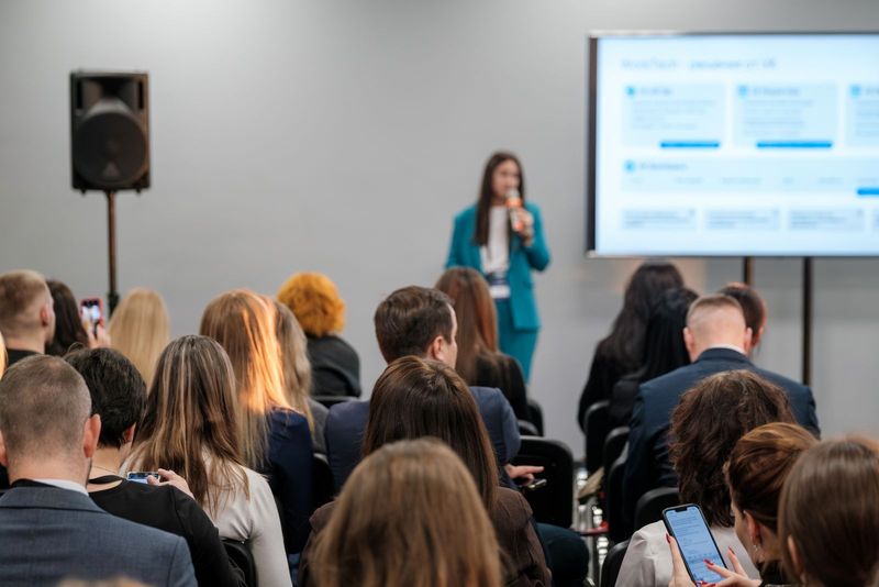Group of people listening to a presentation